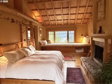 Perched on 42 pristine acres overlooking the Rogue River, this - photo 16