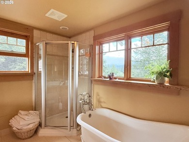 Perched on 42 pristine acres overlooking the Rogue River, this - photo 18