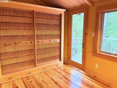 Perched on 42 pristine acres overlooking the Rogue River, this - photo 25