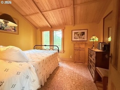 Perched on 42 pristine acres overlooking the Rogue River, this - photo 26