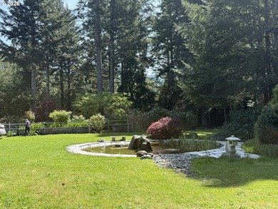 Perched on 42 pristine acres overlooking the Rogue River, this - photo 28