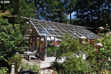 Perched on 42 pristine acres overlooking the Rogue River, this - photo 29