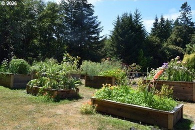 Perched on 42 pristine acres overlooking the Rogue River, this - photo 30