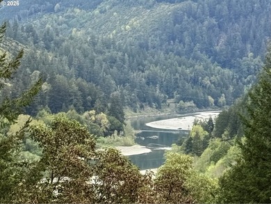 Perched on 42 pristine acres overlooking the Rogue River, this - photo 31