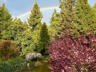 Perched on 42 pristine acres overlooking the Rogue River, this - photo 38