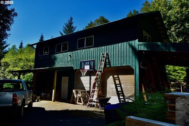 Perched on 42 pristine acres overlooking the Rogue River, this - photo 39