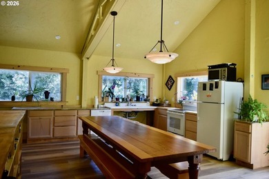 Perched on 42 pristine acres overlooking the Rogue River, this - photo 41
