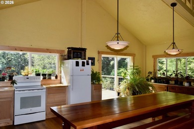 Perched on 42 pristine acres overlooking the Rogue River, this - photo 42