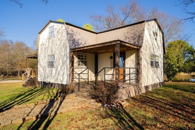 Cozy Cabin Retreat on 8 Acres. Escape to this charming 2-bedroom - photo 1