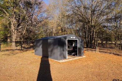 Cozy Cabin Retreat on 8 Acres. Escape to this charming 2-bedroom - photo 10
