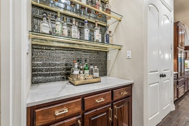 Nestled on a premium interior lot in the Highlands of Trophy - photo 7