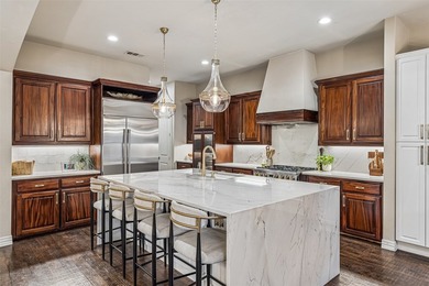 Nestled on a premium interior lot in the Highlands of Trophy - photo 9