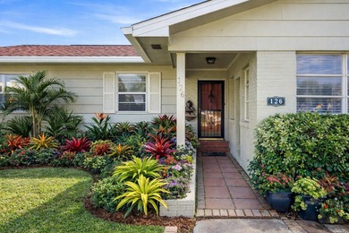 Discover the perfect beach retreat just steps from the - photo 3