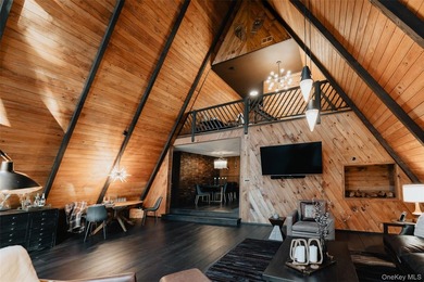 Escape to your own private woodland getaway in this striking - photo 11