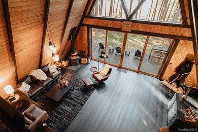 Escape to your own private woodland getaway in this striking - photo 13