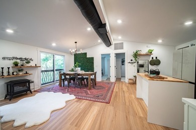 Nestled on a beautiful creek bank with water access to the - photo 14