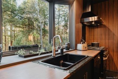 Escape to your own private woodland getaway in this striking - photo 15