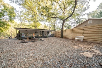 Nestled on a beautiful creek bank with water access to the - photo 28