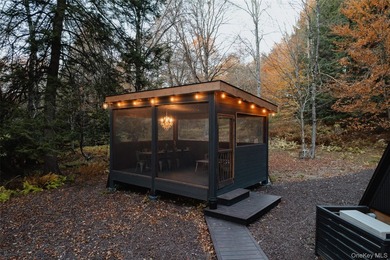 Escape to your own private woodland getaway in this striking - photo 28