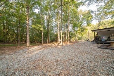 Nestled on a beautiful creek bank with water access to the - photo 29