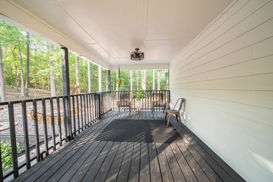 Nestled on a beautiful creek bank with water access to the - photo 31