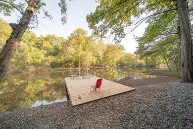 Nestled on a beautiful creek bank with water access to the - photo 33