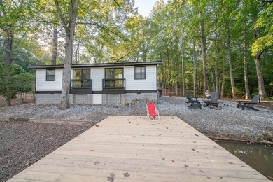 Nestled on a beautiful creek bank with water access to the - photo 34