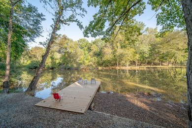 Nestled on a beautiful creek bank with water access to the - photo 35