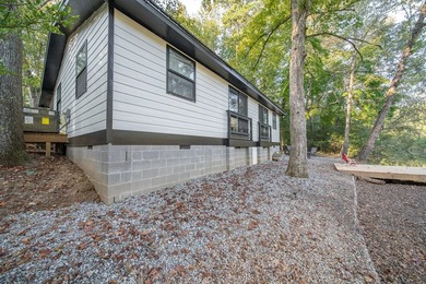 Nestled on a beautiful creek bank with water access to the - photo 38