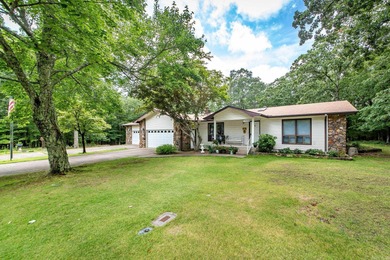 Welcome to your dream home nestled on a quiet, tree-lined - Lake Home For Sale in Fairfield Bay, Arkansas