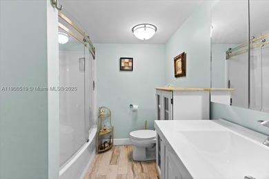 Welcome to this beautifully upgraded corner unit condo in the - photo 13