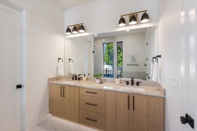 This stunning new home combines modern luxury with thoughtful - photo 22