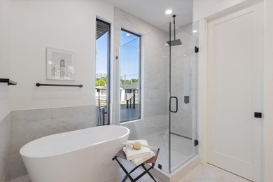 This stunning new home combines modern luxury with thoughtful - photo 23