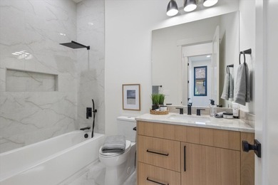 This stunning new home combines modern luxury with thoughtful - photo 25