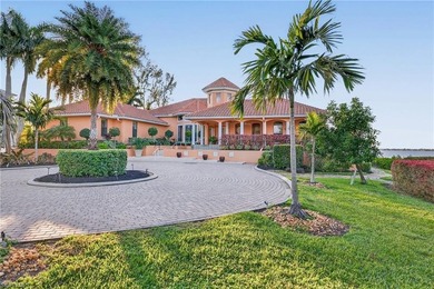 Set behind gates on nearly two acres of prime Caloosahatchee - photo 1