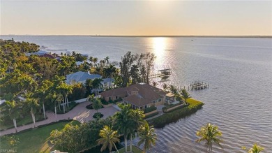 Set behind gates on nearly two acres of prime Caloosahatchee - photo 3