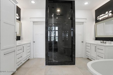 Experience quiet, coastal luxury on .85 acres of waterfront - photo 17