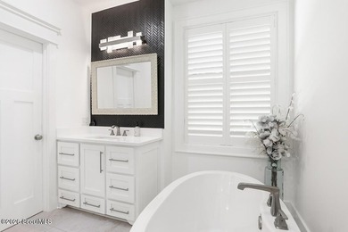 Experience quiet, coastal luxury on .85 acres of waterfront - photo 19