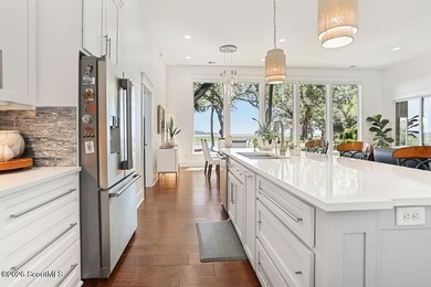 Experience quiet, coastal luxury on .85 acres of waterfront - photo 22