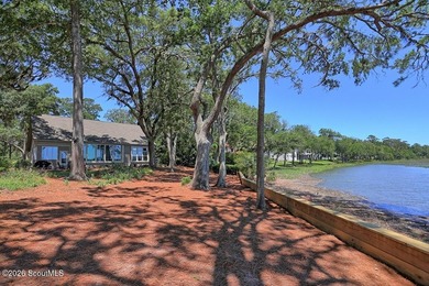Experience quiet, coastal luxury on .85 acres of waterfront - photo 28