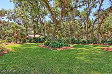 Experience quiet, coastal luxury on .85 acres of waterfront - photo 30