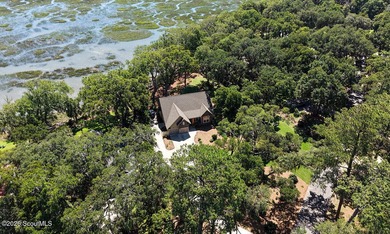 Experience quiet, coastal luxury on .85 acres of waterfront - photo 33