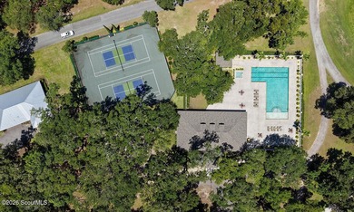 Experience quiet, coastal luxury on .85 acres of waterfront - photo 36