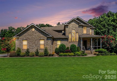 This immaculate 5-bedroom residence blends refined design with - photo 1