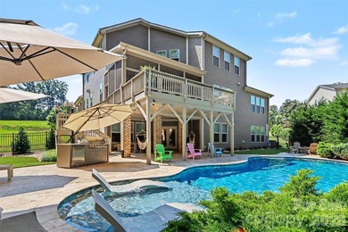 This immaculate 5-bedroom residence blends refined design with - photo 2