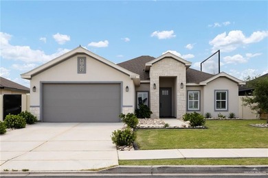 This beautifully maintained home, only a few years old, is - photo 2