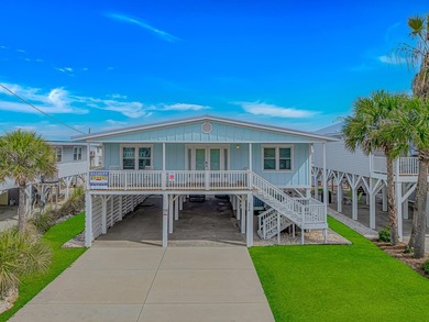 Newly renovated raised beach house located in the highly - photo 1