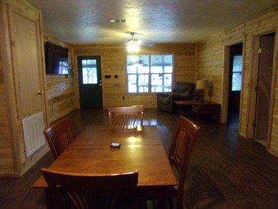 Attractive, log type home sitting on three lots, fenced,  with