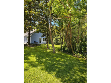 Tucked away on a large, private lot surrounded by beautiful - photo 5