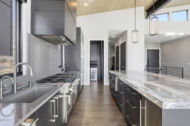 This stunning 4 bedroom home in SkyRidge offers breathtaking - photo 23